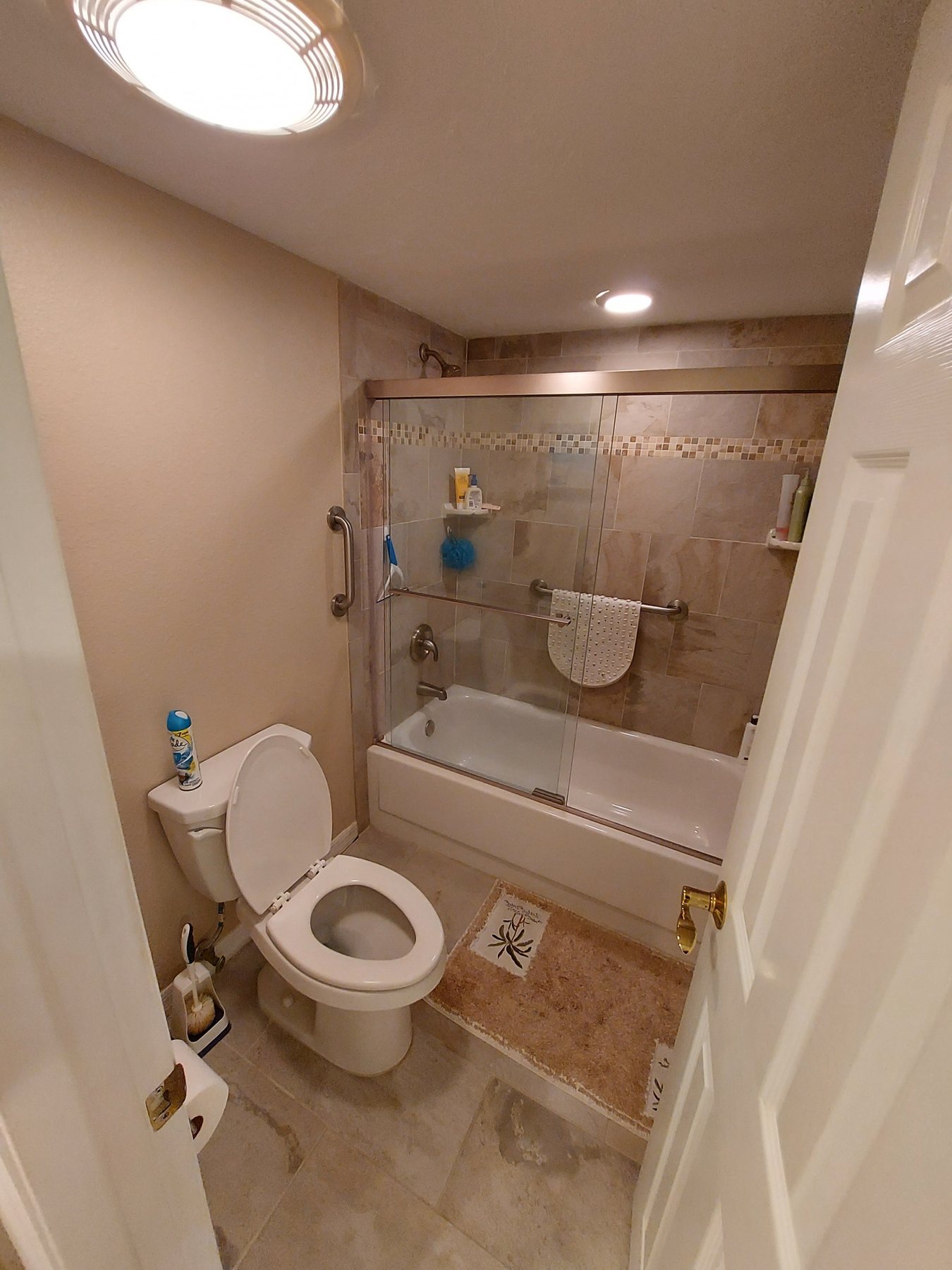 Original tub shower bathroom before renovation